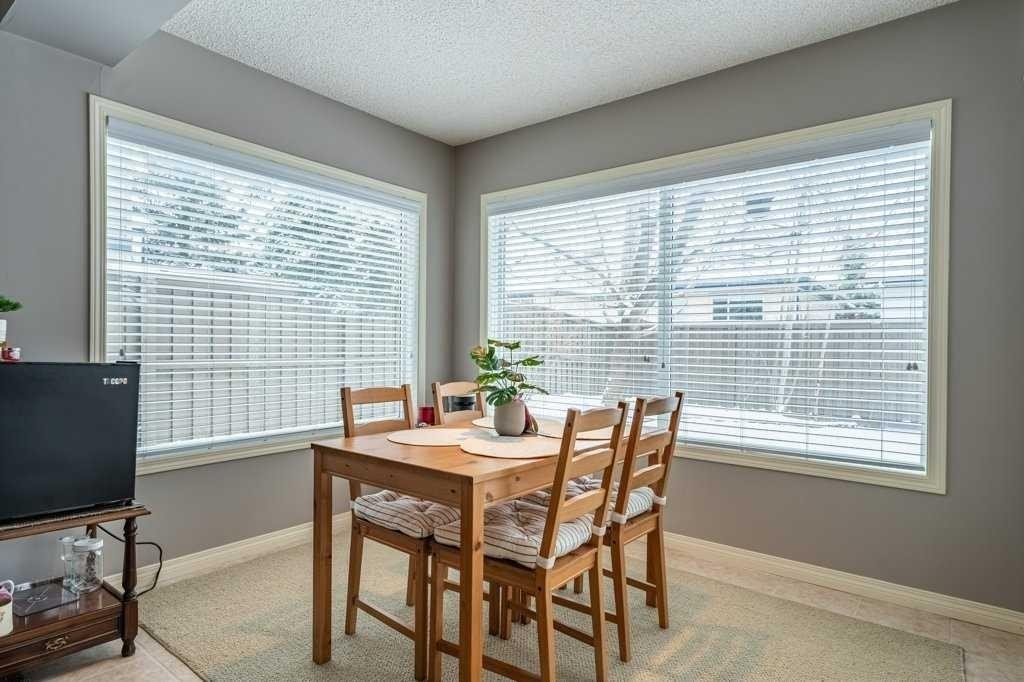 62 Springbluff Boulevard Sw, Calgary, AB - Indoor Photo Showing Dining Room