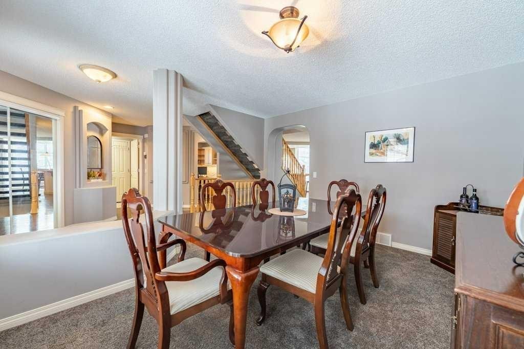 62 Springbluff Boulevard Sw, Calgary, AB - Indoor Photo Showing Dining Room