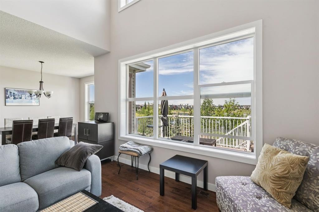 248 Copperpond Circle Se, Calgary, AB - Indoor Photo Showing Living Room