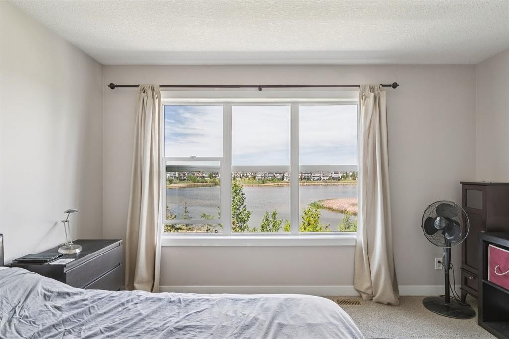 248 Copperpond Circle Se, Calgary, AB - Indoor Photo Showing Bedroom
