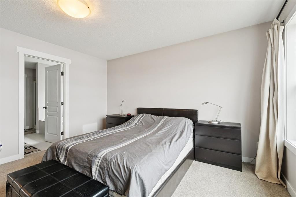 248 Copperpond Circle Se, Calgary, AB - Indoor Photo Showing Bedroom
