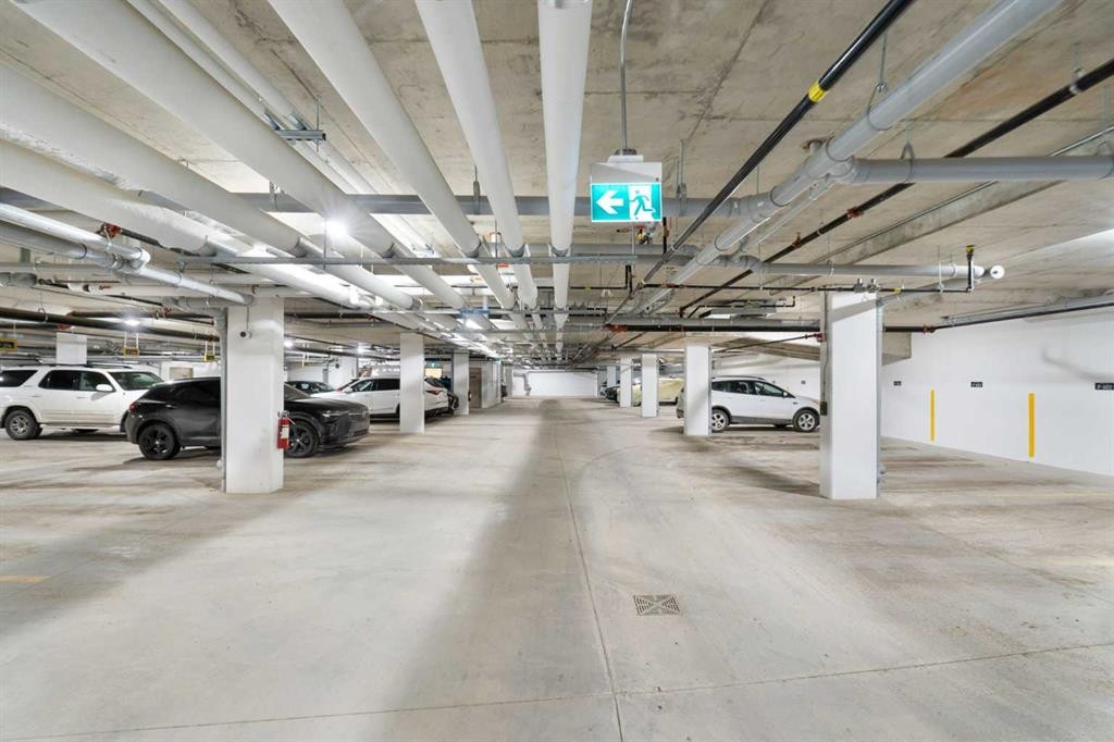 402-1505 Spring Creek Gate, Canmore, AB - Indoor Photo Showing Garage