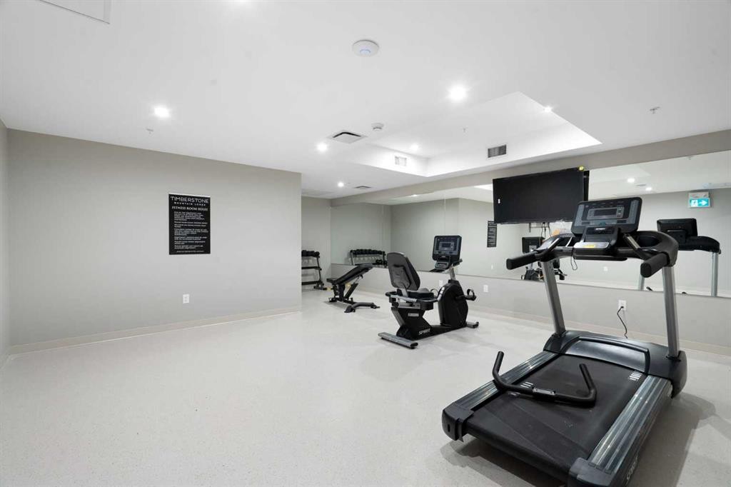 402-1505 Spring Creek Gate, Canmore, AB - Indoor Photo Showing Gym Room