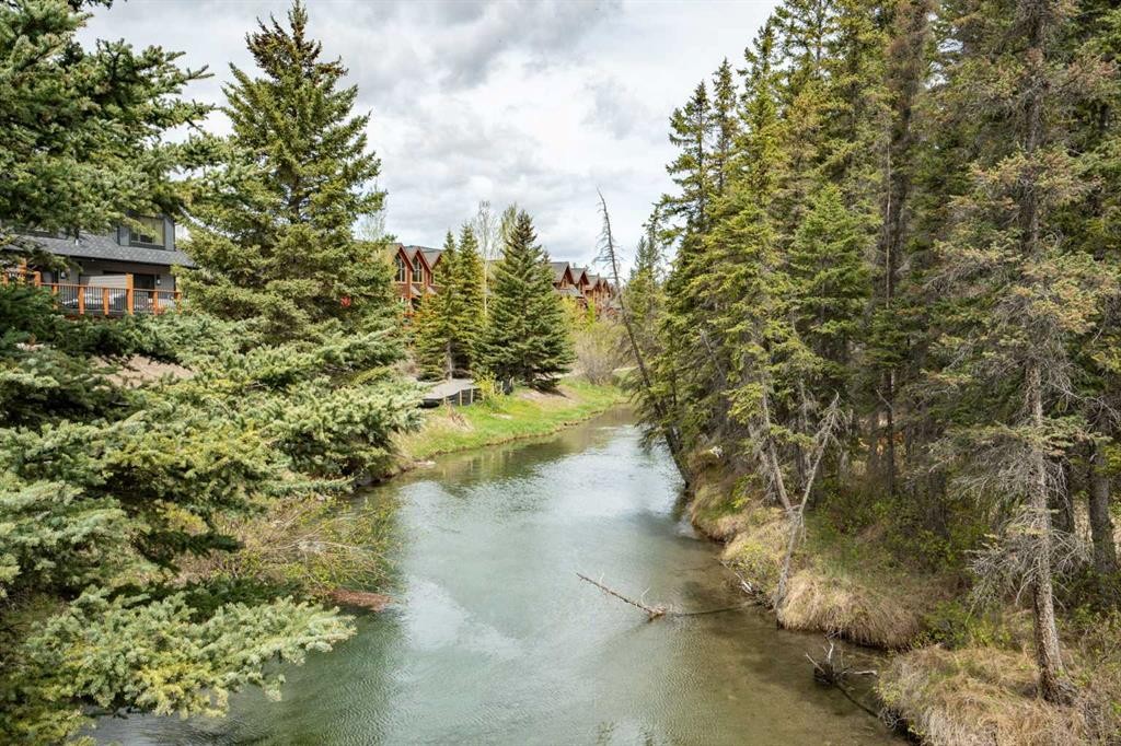 402-1505 Spring Creek Gate, Canmore, AB - Outdoor With Body Of Water With View
