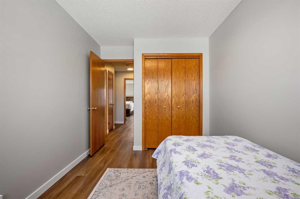 412 Hawkland Place Nw, Calgary, AB - Indoor Photo Showing Bedroom