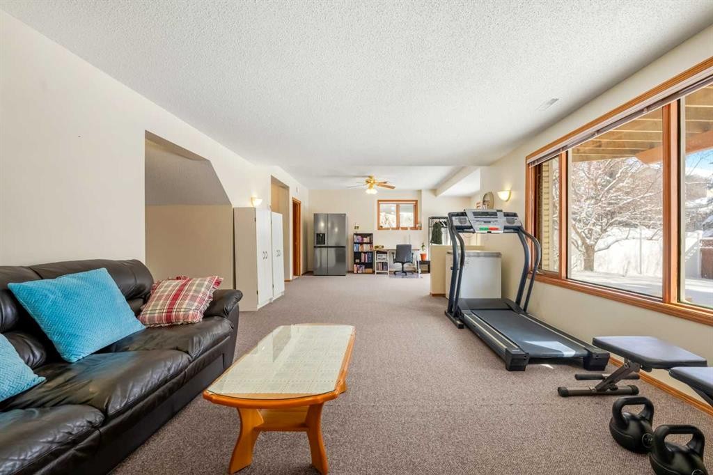 412 Hawkland Place Nw, Calgary, AB - Indoor Photo Showing Gym Room