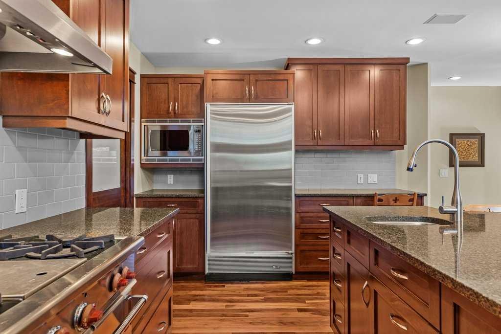 16 Blue Grouse Ridge, Canmore, AB - Indoor Photo Showing Kitchen With Upgraded Kitchen