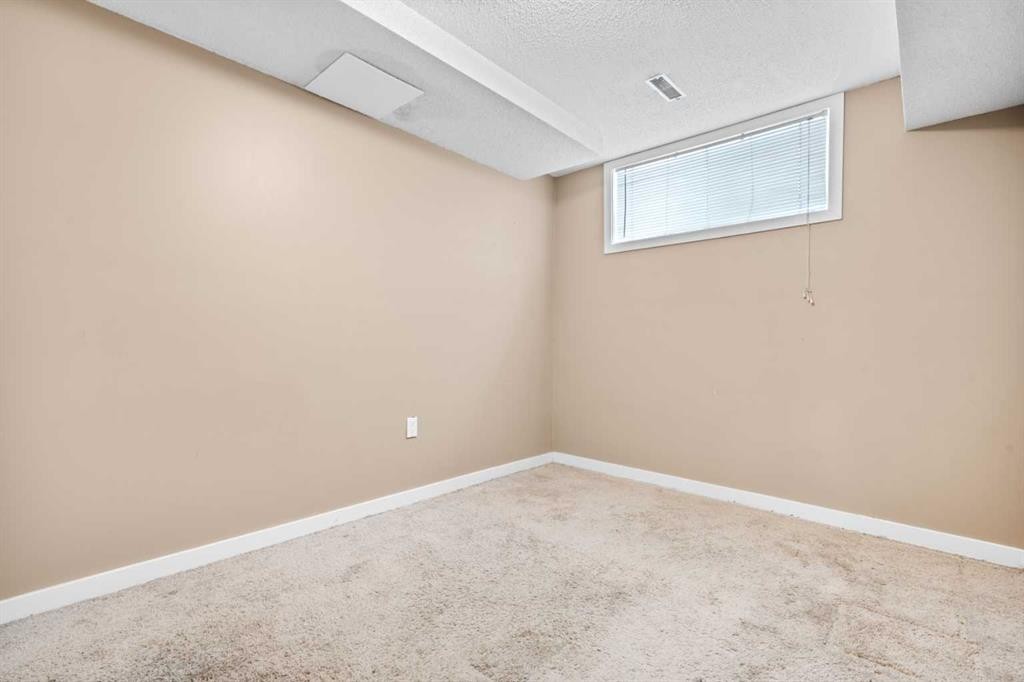 58 Templeson Crescent Ne, Calgary, AB - Indoor Photo Showing Other Room