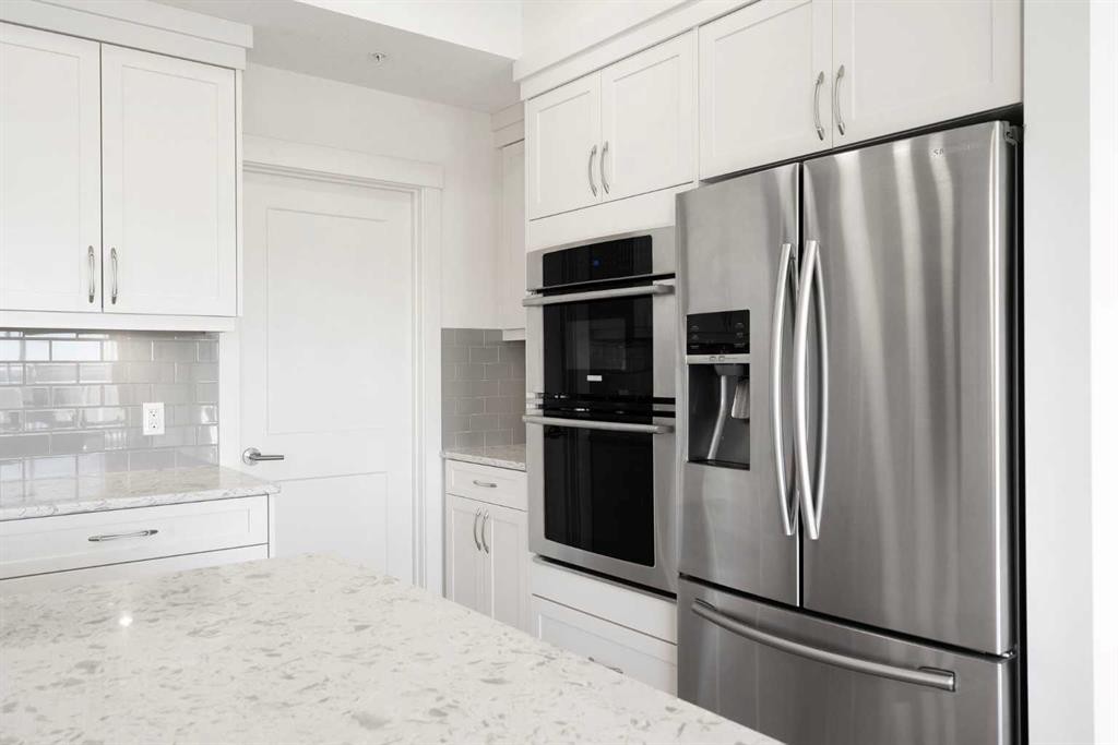 332-20 Seton Park Se, Calgary, AB - Indoor Photo Showing Kitchen With Stainless Steel Kitchen