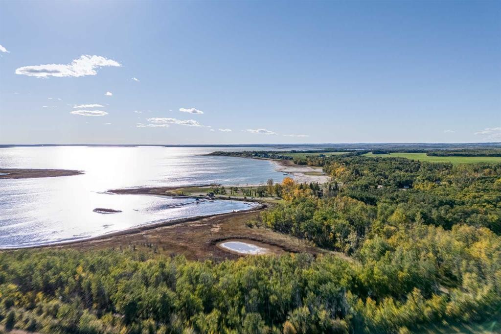 602 Pheasant Close, Pelican Point, AB - Outdoor With Body Of Water With View