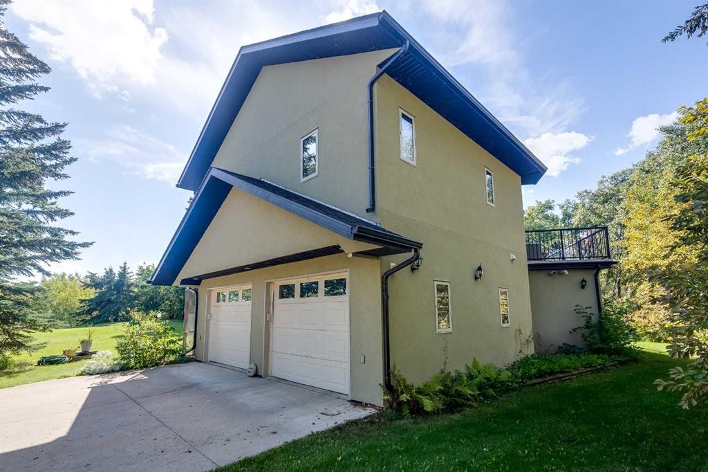 602 Pheasant Close, Pelican Point, AB - Outdoor With Exterior