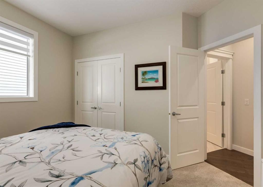 60 Crestbrook View Sw, Calgary, AB - Indoor Photo Showing Bedroom