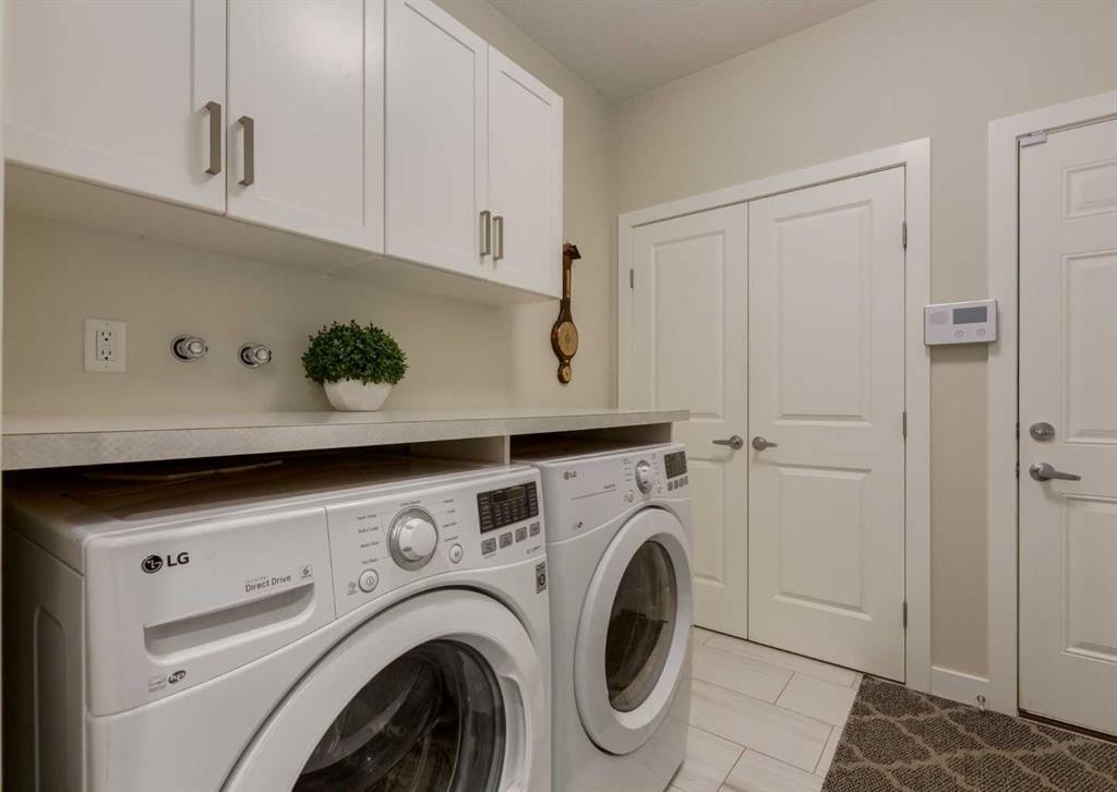 60 Crestbrook View Sw, Calgary, AB - Indoor Photo Showing Laundry Room