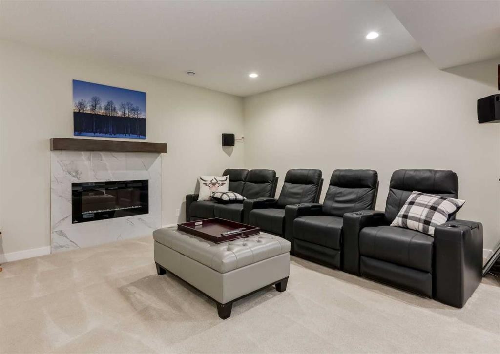 60 Crestbrook View Sw, Calgary, AB - Indoor Photo Showing Living Room With Fireplace