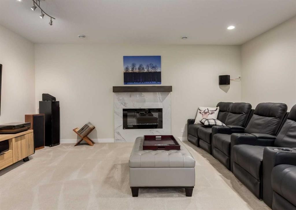 60 Crestbrook View Sw, Calgary, AB - Indoor With Fireplace
