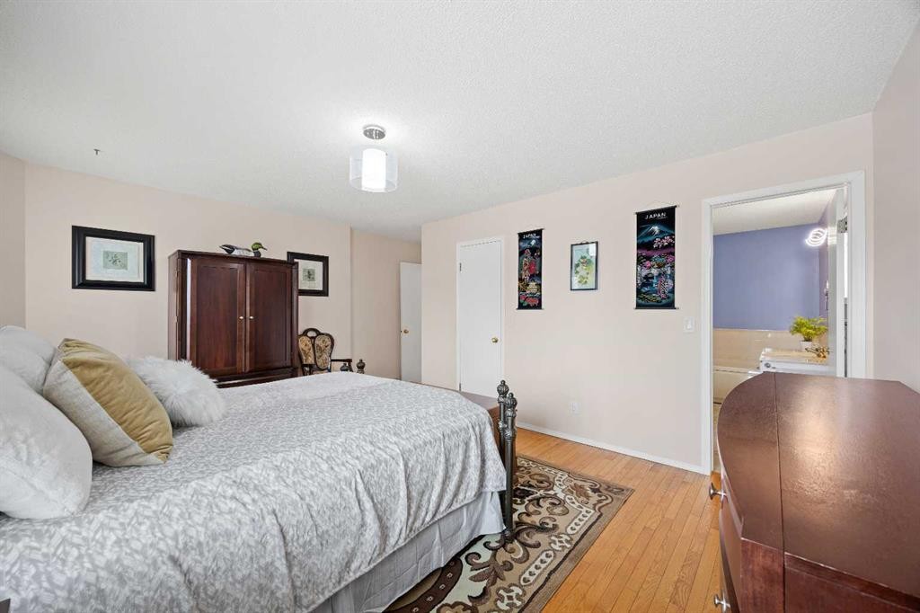 1331 Sunvista Way Se, Calgary, AB - Indoor Photo Showing Bedroom