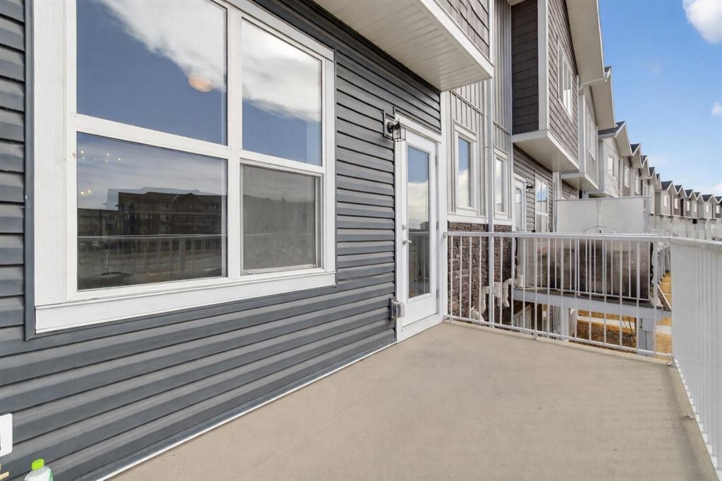 403-137 Red Embers Link Ne, Calgary, AB - Outdoor With Balcony With Exterior