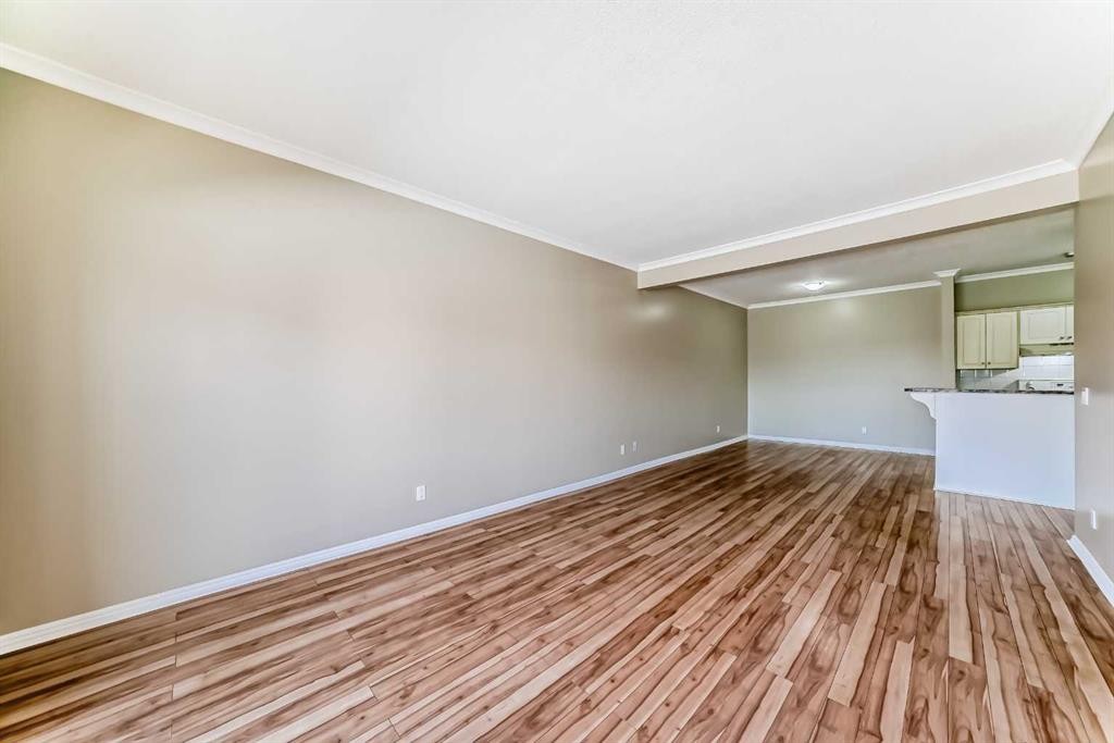 205-7 Lineham Avenue, Okotoks, AB - Indoor Photo Showing Other Room