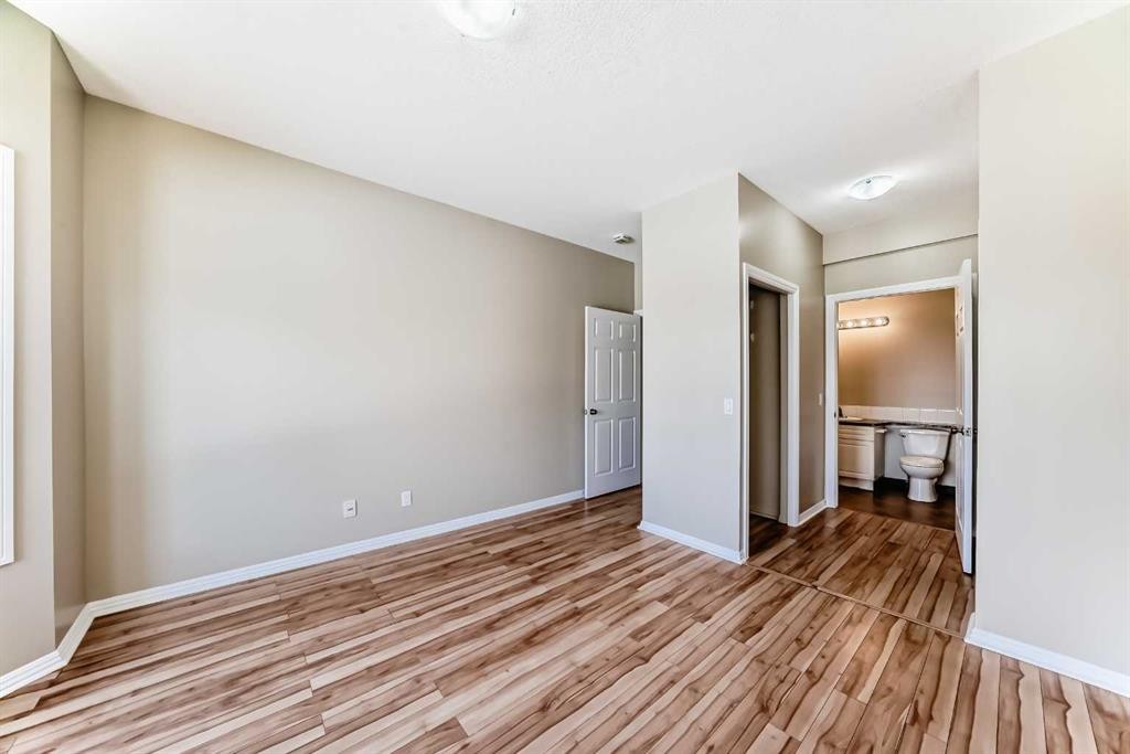 205-7 Lineham Avenue, Okotoks, AB - Indoor Photo Showing Other Room