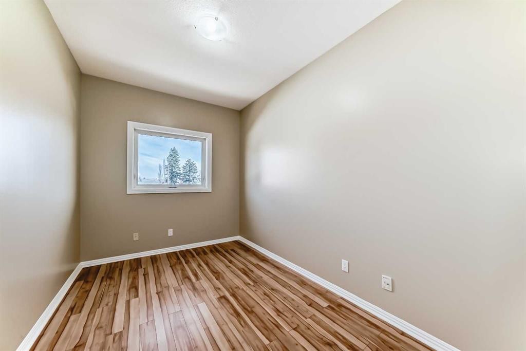 205-7 Lineham Avenue, Okotoks, AB - Indoor Photo Showing Other Room