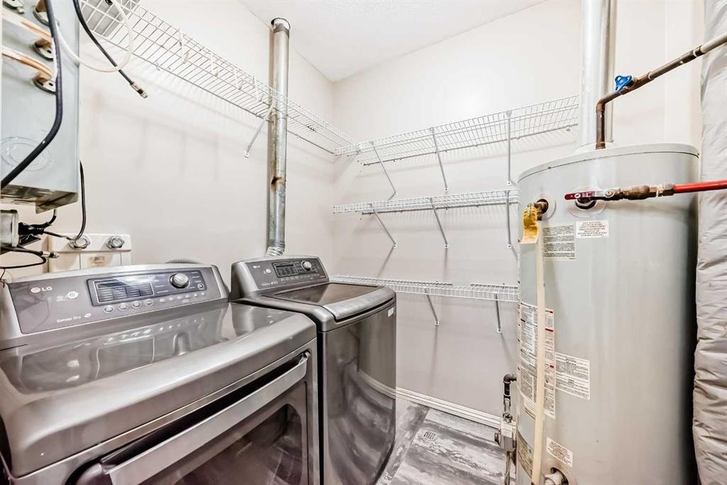 205-7 Lineham Avenue, Okotoks, AB - Indoor Photo Showing Laundry Room