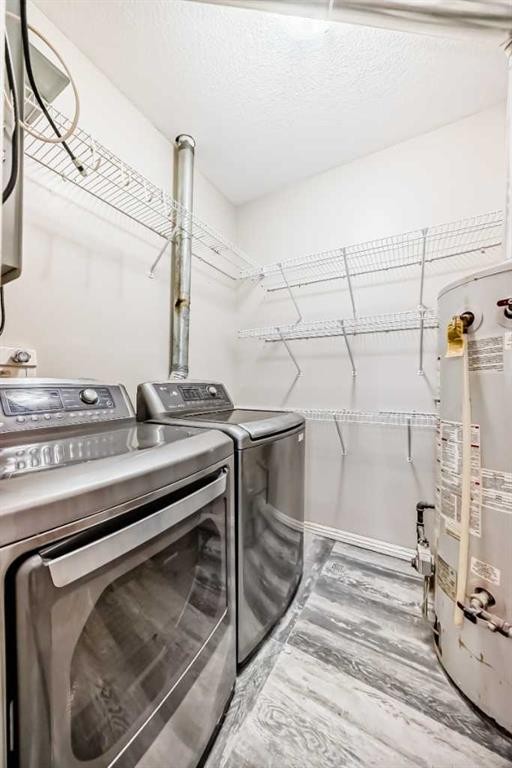 205-7 Lineham Avenue, Okotoks, AB - Indoor Photo Showing Laundry Room