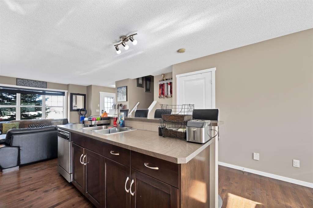 108 Panamount Way Nw, Calgary, AB - Indoor Photo Showing Kitchen With Double Sink