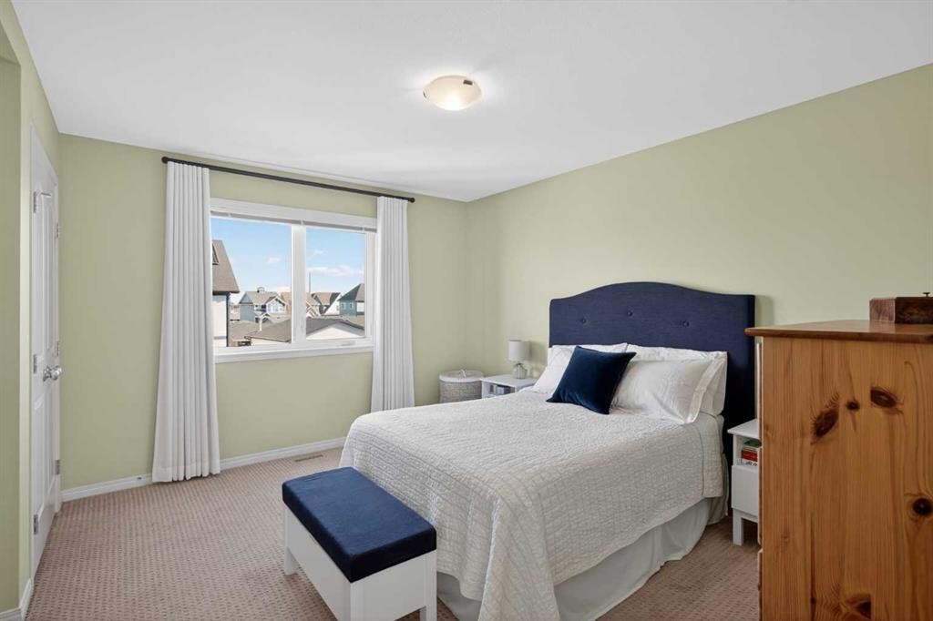 228 Mahogany Grove Se, Calgary, AB - Indoor Photo Showing Bedroom