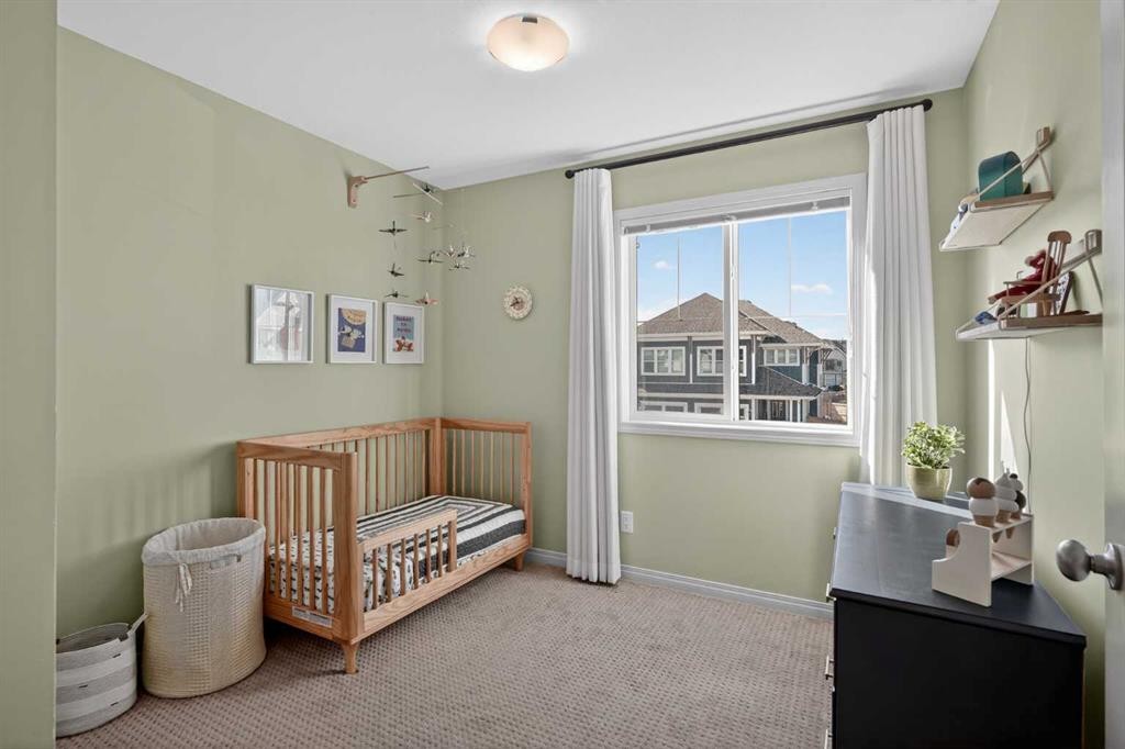 228 Mahogany Grove Se, Calgary, AB - Indoor Photo Showing Bedroom