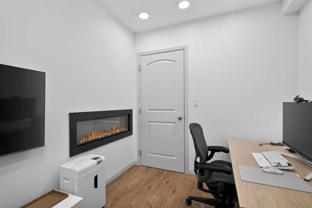 228 Mahogany Grove Se, Calgary, AB - Indoor Photo Showing Office With Fireplace