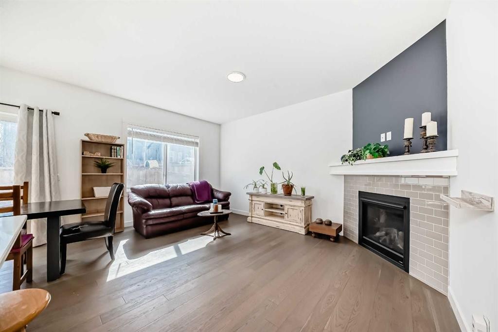 357 Nolanhurst Crescent Nw, Calgary, AB - Indoor Photo Showing Living Room With Fireplace