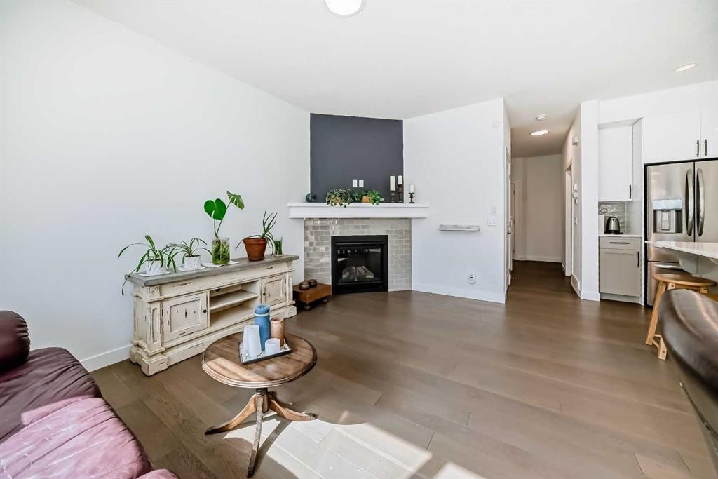 357 Nolanhurst Crescent Nw, Calgary, AB - Indoor Photo Showing Living Room With Fireplace