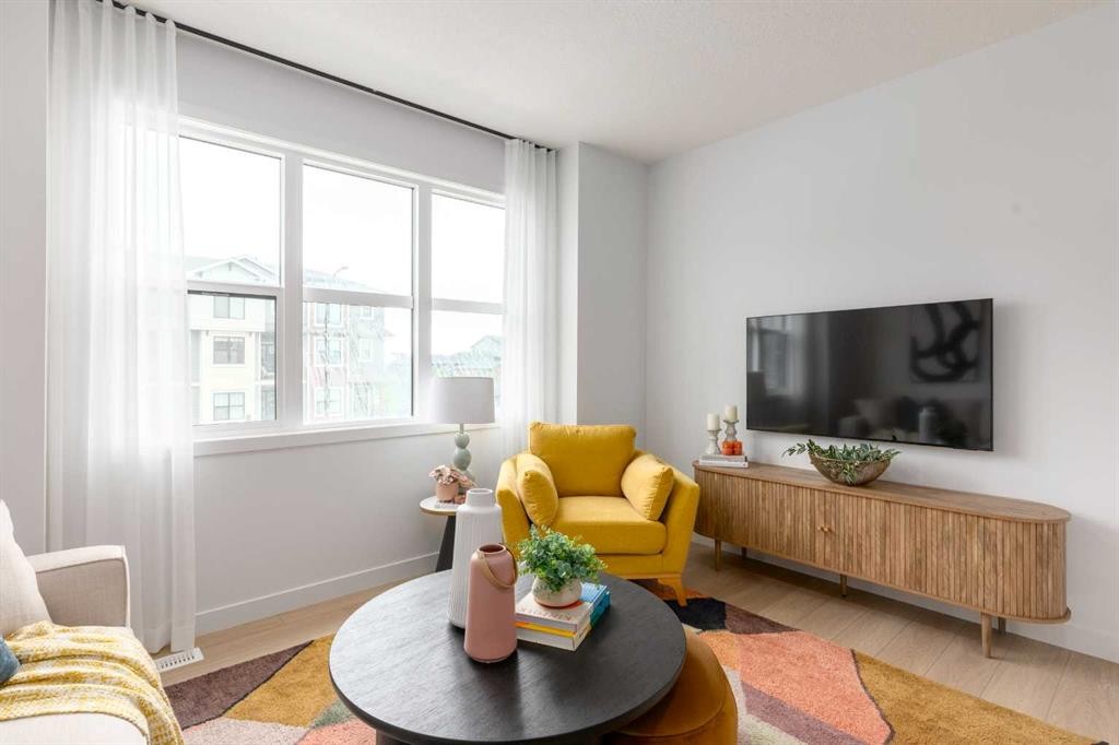 78 Heirloom Passage Se, Calgary, AB - Indoor Photo Showing Living Room