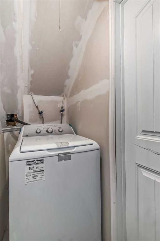 211 Saddlebrook Way Ne, Calgary, AB - Indoor Photo Showing Laundry Room