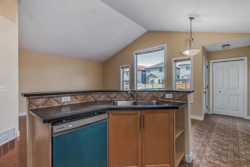 211 Saddlebrook Way Ne, Calgary, AB - Indoor Photo Showing Kitchen With Double Sink
