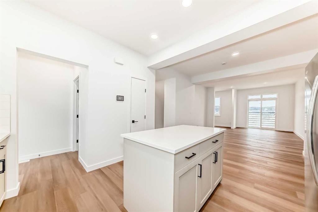 86 Heirloom Passage Se, Calgary, AB - Indoor Photo Showing Other Room