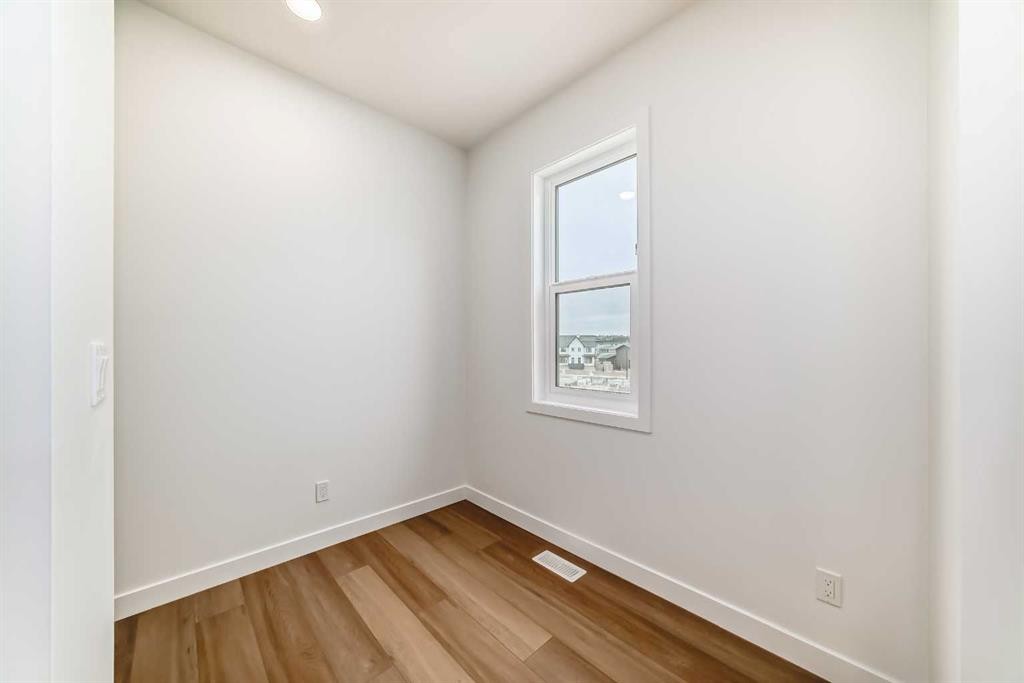 86 Heirloom Passage Se, Calgary, AB - Indoor Photo Showing Other Room