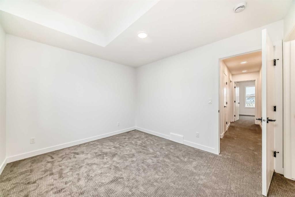 86 Heirloom Passage Se, Calgary, AB - Indoor Photo Showing Other Room
