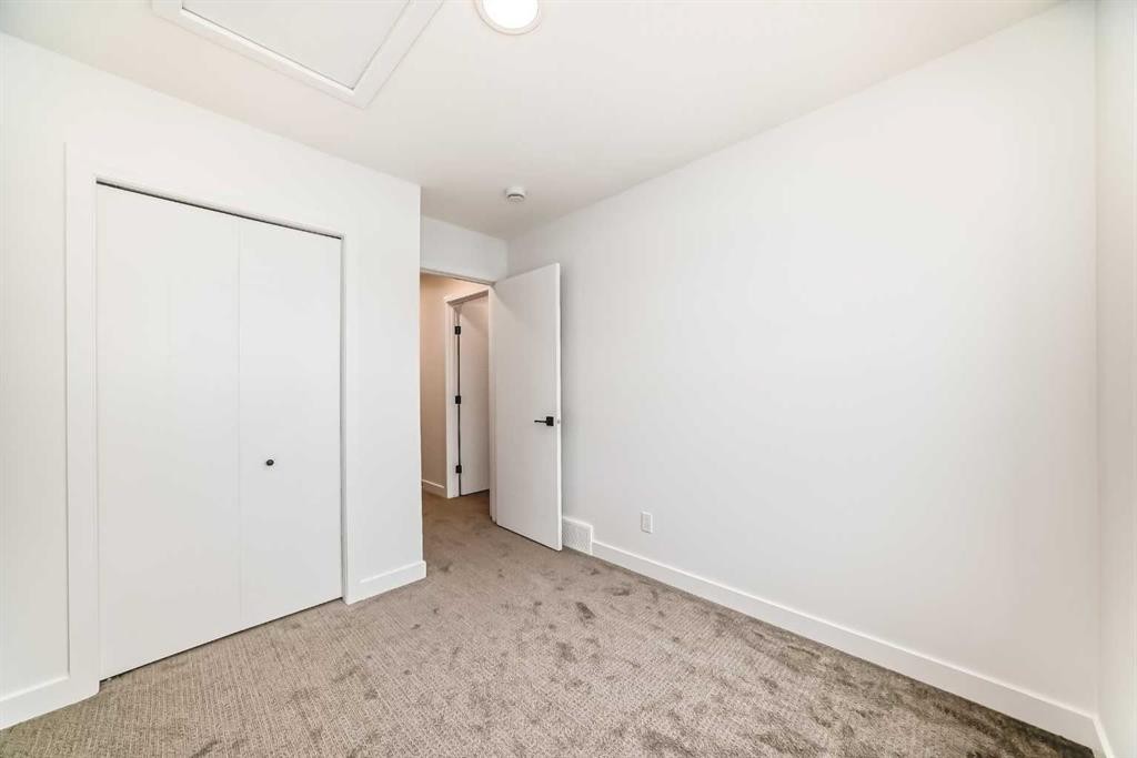 86 Heirloom Passage Se, Calgary, AB - Indoor Photo Showing Other Room