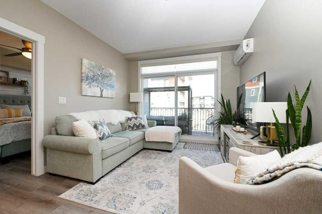 210-20 Walgrove Walk Se, Calgary, AB - Indoor Photo Showing Living Room