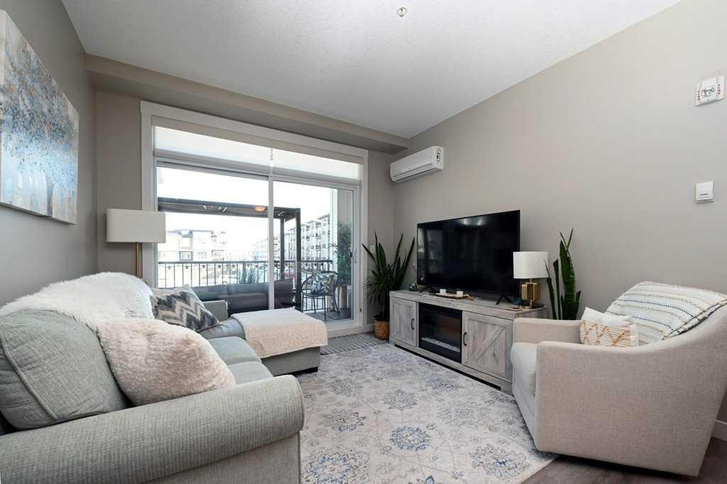 210-20 Walgrove Walk Se, Calgary, AB - Indoor Photo Showing Living Room