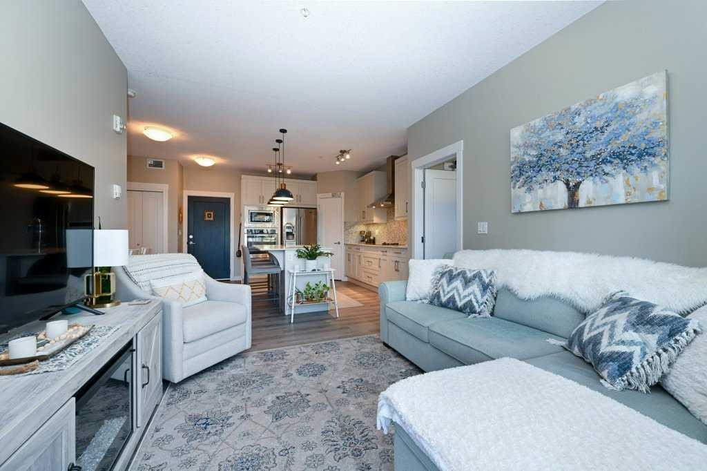 210-20 Walgrove Walk Se, Calgary, AB - Indoor Photo Showing Living Room