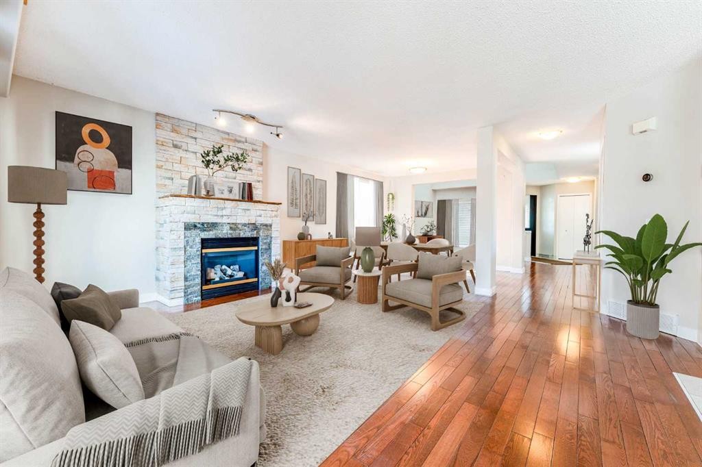 343 Millview Bay Sw, Calgary, AB - Indoor Photo Showing Living Room With Fireplace