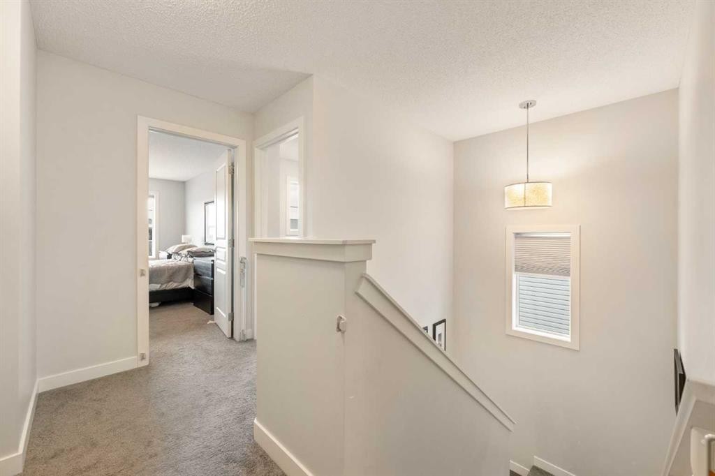 150 Auburn Springs Boulevard Se, Calgary, AB - Indoor Photo Showing Other Room
