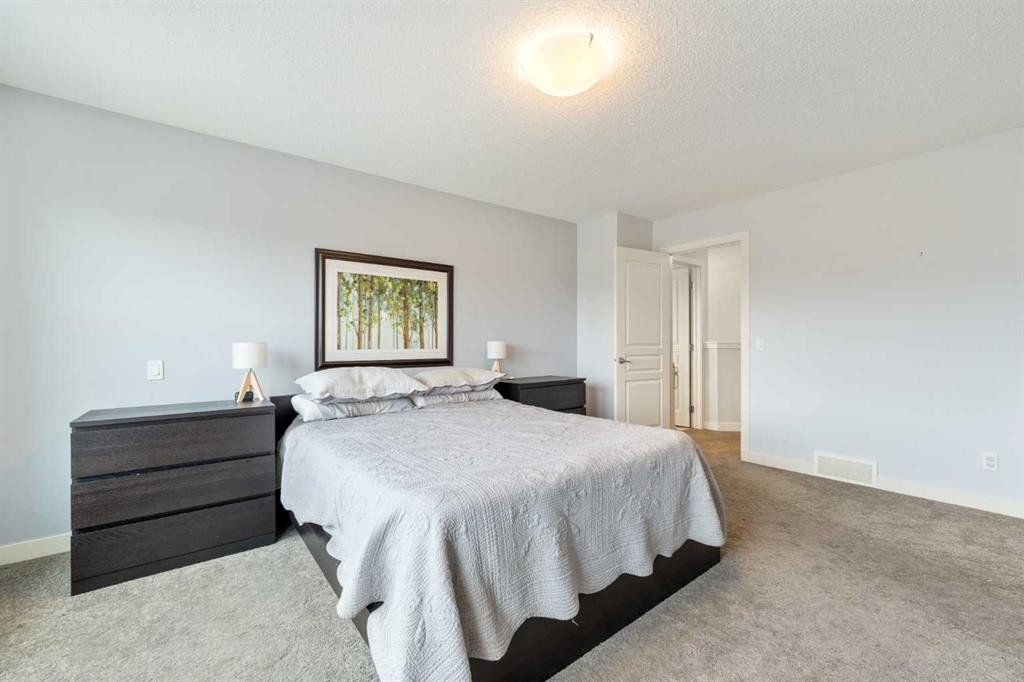 150 Auburn Springs Boulevard Se, Calgary, AB - Indoor Photo Showing Bedroom