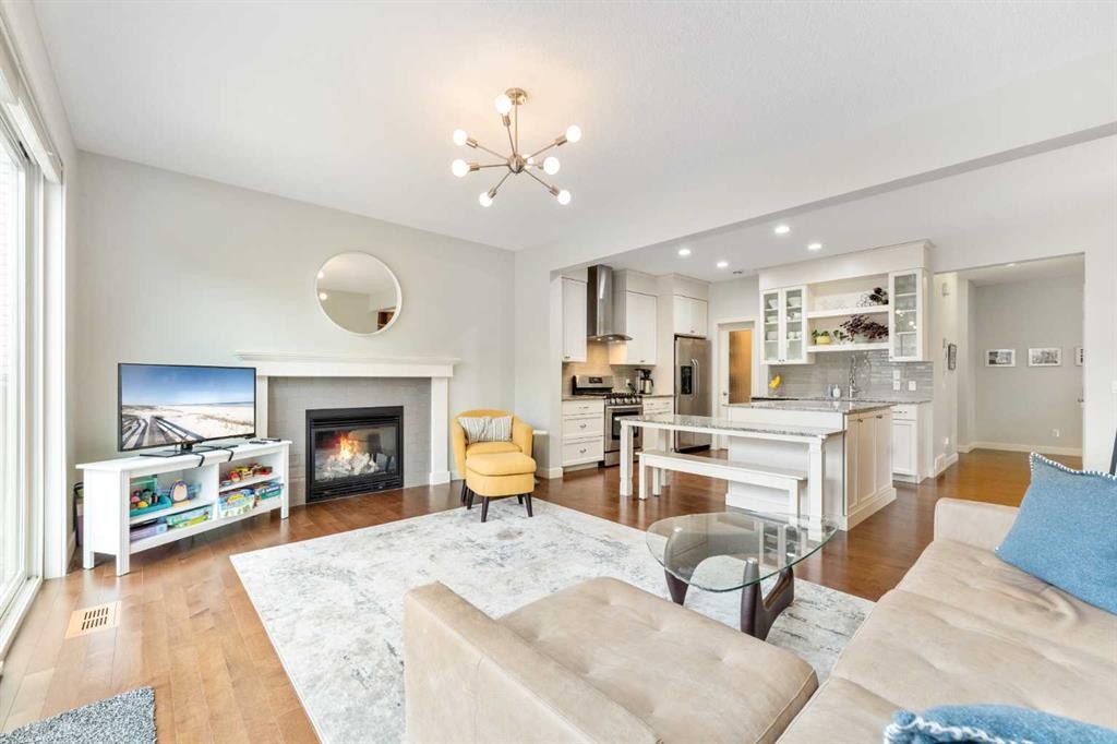150 Auburn Springs Boulevard Se, Calgary, AB - Indoor Photo Showing Living Room With Fireplace