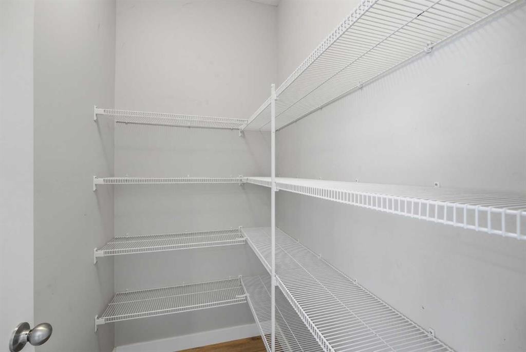 125 Edith Gate Nw, Calgary, AB - Indoor With Storage