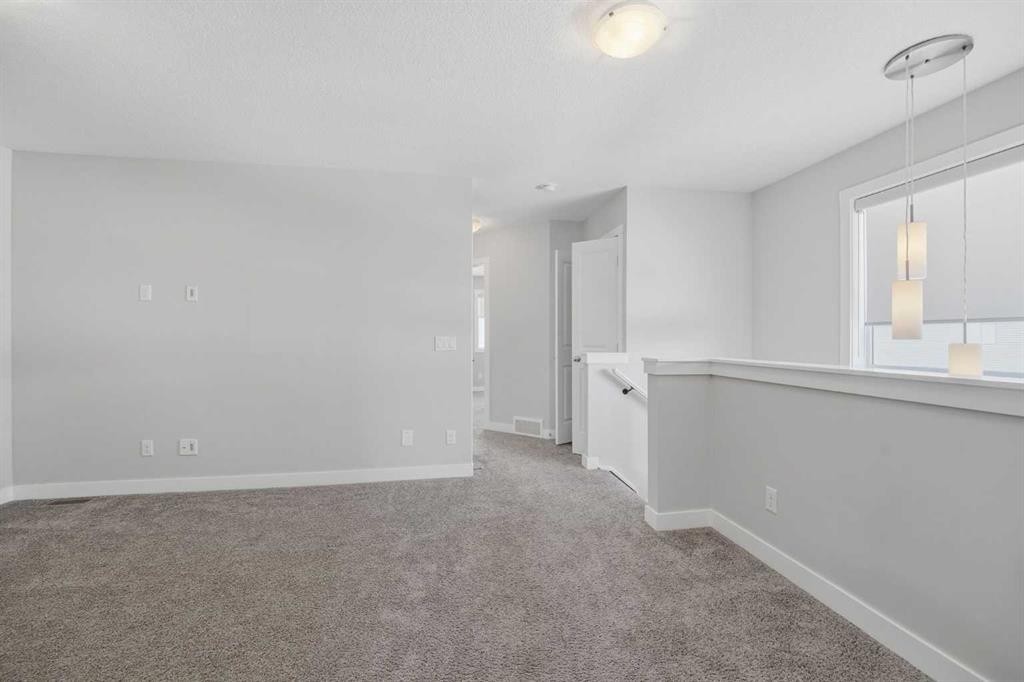 125 Edith Gate Nw, Calgary, AB - Indoor Photo Showing Other Room