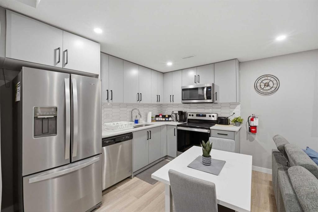 125 Edith Gate Nw, Calgary, AB - Indoor Photo Showing Kitchen With Stainless Steel Kitchen