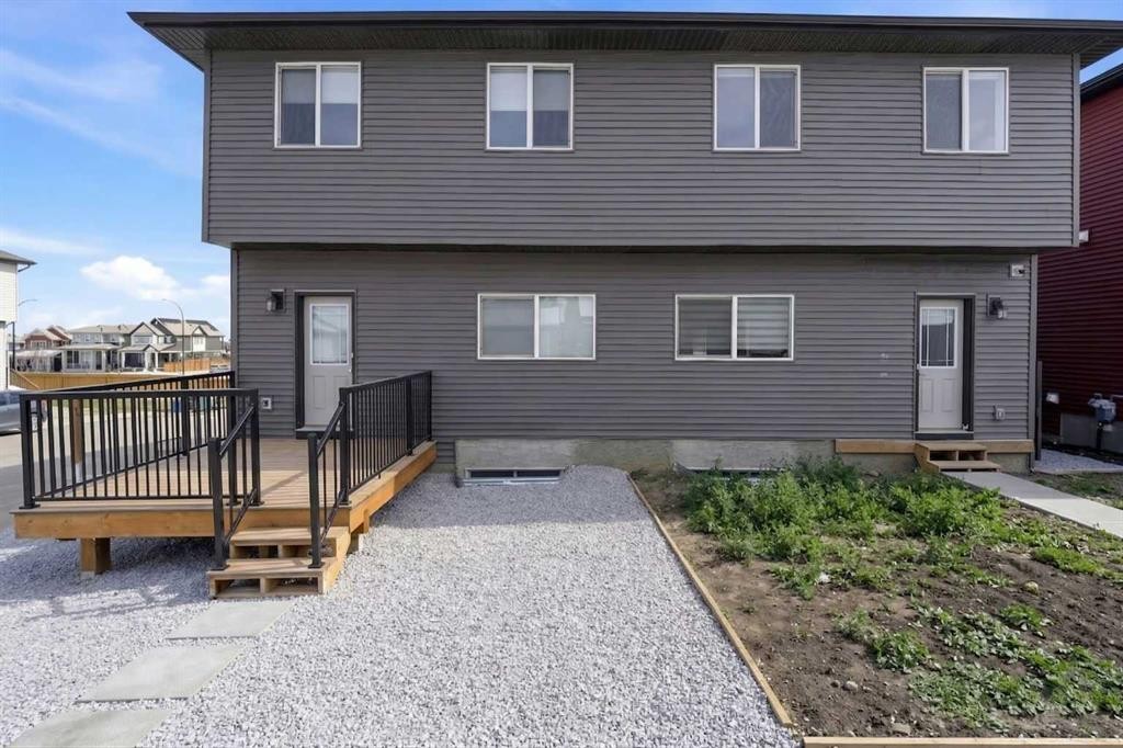 125 Edith Gate Nw, Calgary, AB - Outdoor With Exterior